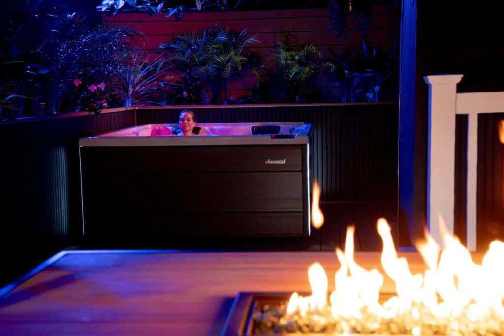 Jacuzzi J 404 Hot Tub Platinum Modern Hardwood Night Lifestyle 01 - Jacuzzi Hot Tubs Atlanta